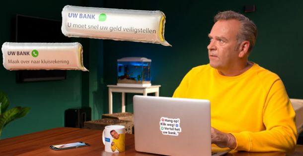Marc van Veilig Bankieren zit achter zijn laptop